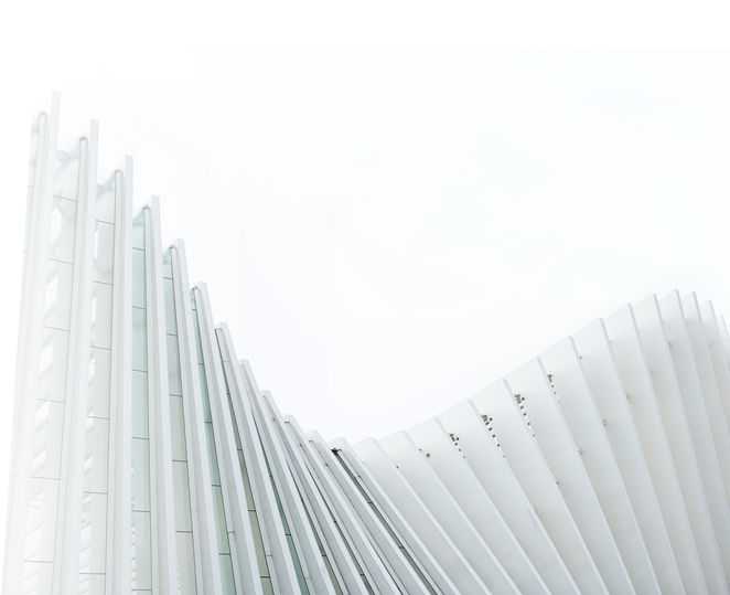 Architectural white façade with vertical fins curving into a sweeping arc